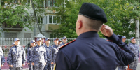 В Томске состоялось торжественное построение личного состава Росгвардии в честь Дня Государственного флага России - Росгвардия